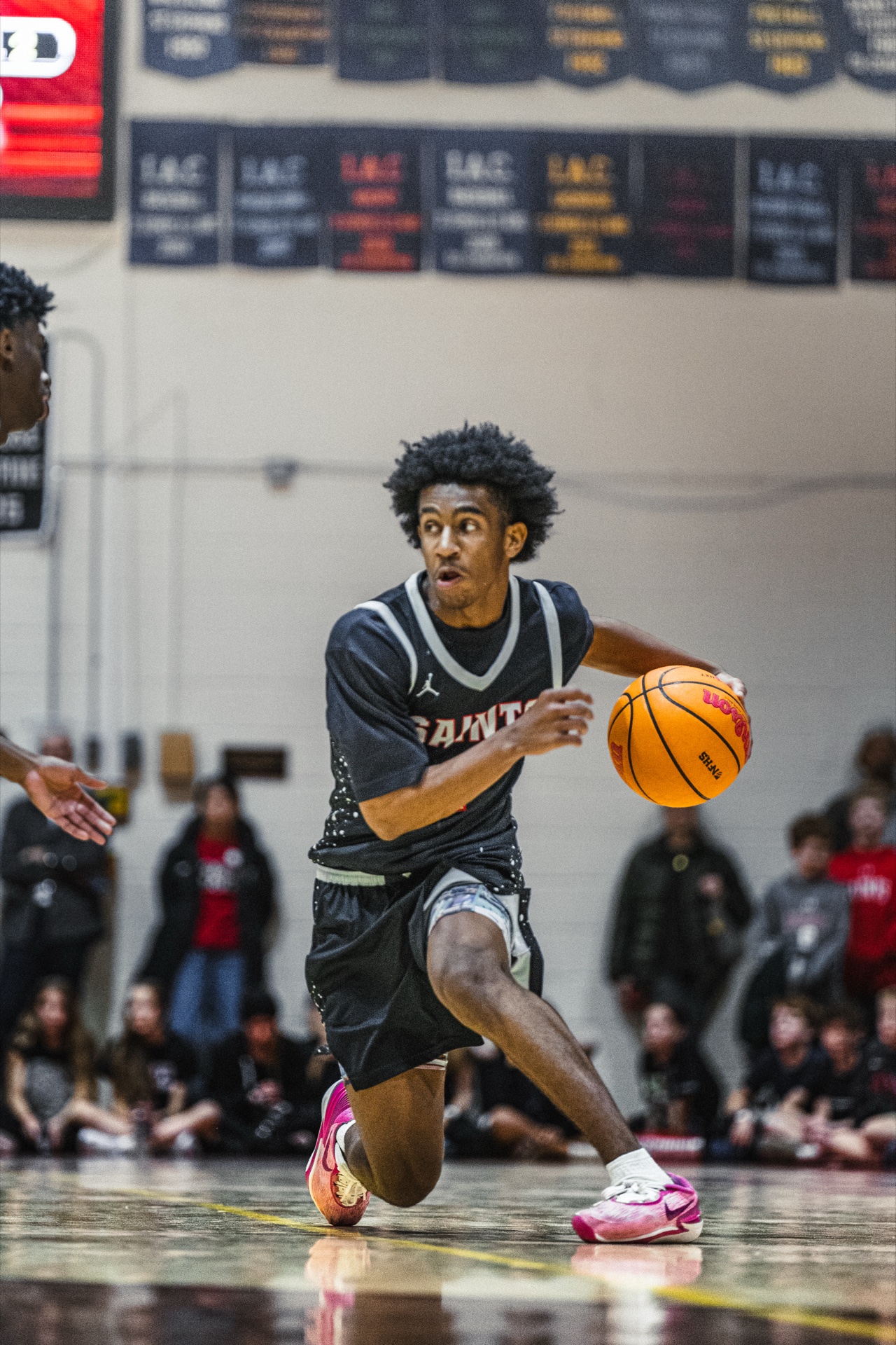 St. Stephen's Saints driving to the basket